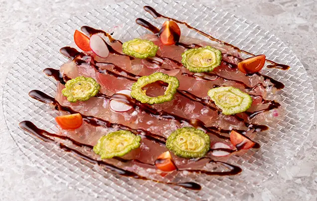 鮮魚のカルパッチョ ゴーヤのフリットと共に